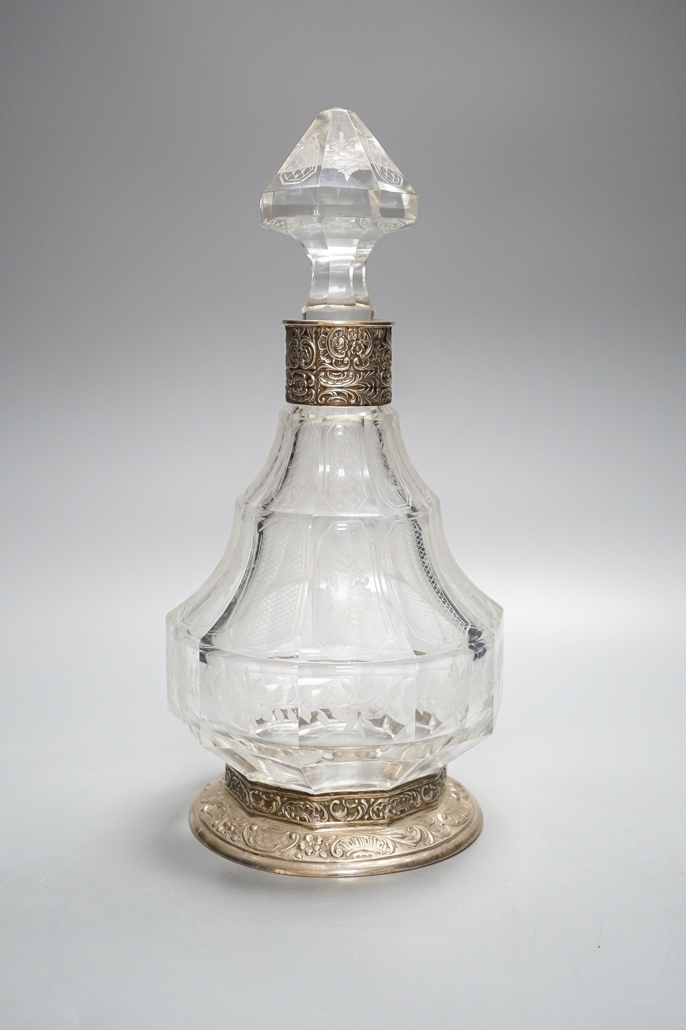 A 1920s German silver mounted wheel engraved glass decanter 32cm